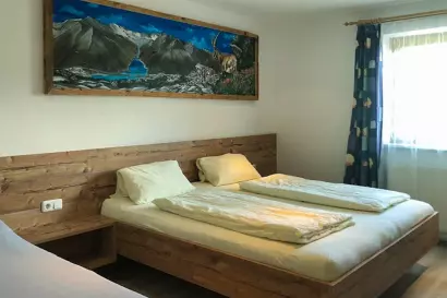 10-Ferienwohnung_Tropper-Floerl_Gerlosberg_dreibettzimmer